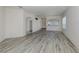 Bright living room featuring wood-look floors and an open floor plan at 1622 Monarch Dr # 1622, Venice, FL 34293