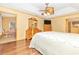 Main bedroom with hardwood floors and access to the patio at 16093 Hillsborough Blvd, Port Charlotte, FL 33954