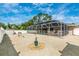 Large backyard with screened pool and landscaping at 16093 Hillsborough Blvd, Port Charlotte, FL 33954
