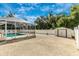 Spacious backyard with pool, shed, and gravel area at 16093 Hillsborough Blvd, Port Charlotte, FL 33954