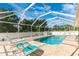 Relaxing screened pool and patio area at 16093 Hillsborough Blvd, Port Charlotte, FL 33954