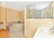 Elegant bathroom with soaking tub, shower, and double vanity at 16093 Hillsborough Blvd, Port Charlotte, FL 33954