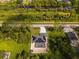 Aerial view of property showing house and surroundings at 16093 Hillsborough Blvd, Port Charlotte, FL 33954
