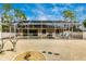 Screened pool and patio with grilling area at 16093 Hillsborough Blvd, Port Charlotte, FL 33954
