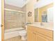 Clean bathroom with tub, shower, and updated vanity at 16093 Hillsborough Blvd, Port Charlotte, FL 33954