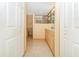 Bathroom with double sinks and access to closets at 16093 Hillsborough Blvd, Port Charlotte, FL 33954