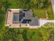 House with pool and solar panels from above at 16093 Hillsborough Blvd, Port Charlotte, FL 33954