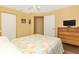Bedroom with double bed, dresser, and wood floors at 16093 Hillsborough Blvd, Port Charlotte, FL 33954