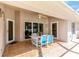 Covered patio with seating and access to the pool at 16093 Hillsborough Blvd, Port Charlotte, FL 33954