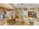 Kitchen features breakfast nook, ample counter space, and views of the pool at 1136 Highland Greens Dr, Venice, FL 34285
