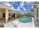 Relaxing pool area with screened enclosure and patio at 1136 Highland Greens Dr, Venice, FL 34285