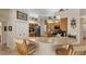 Well-equipped kitchen with a large island and plenty of cabinet storage at 1136 Highland Greens Dr, Venice, FL 34285