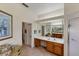 Bathroom with double vanity and a walk-in shower at 1136 Highland Greens Dr, Venice, FL 34285