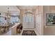 Spacious entryway with double doors and a decorative rug at 1136 Highland Greens Dr, Venice, FL 34285