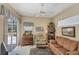 Relaxing living room with a comfortable couch and built-in shelves at 1136 Highland Greens Dr, Venice, FL 34285