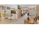 Open concept kitchen with breakfast bar and views into the living room at 1136 Highland Greens Dr, Venice, FL 34285