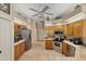 Bright kitchen featuring stainless steel appliances and ample cabinetry at 1136 Highland Greens Dr, Venice, FL 34285