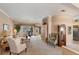 Spacious living room with neutral color palette and ample natural light at 1136 Highland Greens Dr, Venice, FL 34285