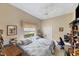 Guest bedroom with two twin beds and a home office area at 1136 Highland Greens Dr, Venice, FL 34285