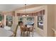Breakfast nook with pool view, perfect for casual dining at 1136 Highland Greens Dr, Venice, FL 34285