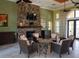 Relaxing community room with fireplace and comfortable seating at 232 Carlino Dr, Nokomis, FL 34275