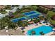Aerial view of community pool and pickleball courts at 232 Carlino Dr, Nokomis, FL 34275
