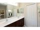 Bathroom with double vanity and large mirror at 232 Carlino Dr, Nokomis, FL 34275
