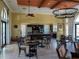 Spacious community kitchen with island and dining tables at 232 Carlino Dr, Nokomis, FL 34275