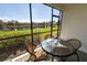 Enjoy serene lake views from this screened lanai, perfect for relaxing at 232 Carlino Dr, Nokomis, FL 34275