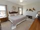 Large main bedroom with king-size bed, ample natural light, and ensuite bathroom at 232 Carlino Dr, Nokomis, FL 34275