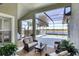 Outdoor oasis featuring a screened lanai and pool at 23787 Waverly Cir, Venice, FL 34293