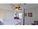 Comfortable bedroom with post bed and dresser at 23787 Waverly Cir, Venice, FL 34293
