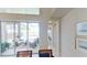 Spacious dining room with sliding glass doors leading to a relaxing patio and pool area at 23787 Waverly Cir, Venice, FL 34293