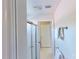 Bathroom with shower and access to other rooms at 23787 Waverly Cir, Venice, FL 34293