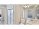 Clean bathroom with shower, toilet, and vanity at 23787 Waverly Cir, Venice, FL 34293