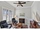 Sunlit home office with hardwood floors and custom cabinetry at 23787 Waverly Cir, Venice, FL 34293