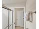Bathroom with shower and access to another room at 23787 Waverly Cir, Venice, FL 34293