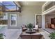 Comfortable patio with wicker furniture near the pool at 23787 Waverly Cir, Venice, FL 34293