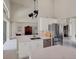 Open concept kitchen features white cabinets and stainless steel appliances at 23787 Waverly Cir, Venice, FL 34293