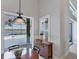 Modern kitchen with white cabinets and stainless steel appliances at 23787 Waverly Cir, Venice, FL 34293