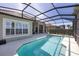 Inviting screened pool with spacious patio at 23787 Waverly Cir, Venice, FL 34293