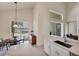 Bright breakfast nook with lake view and access to the backyard at 23787 Waverly Cir, Venice, FL 34293