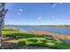 Serene lakefront view from the backyard at 23787 Waverly Cir, Venice, FL 34293