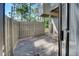 Private patio with access from sliding glass doors at 201 Woodland Dr # 201, Osprey, FL 34229