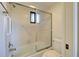 Bathroom with shower/tub combo and updated fixtures at 201 Woodland Dr # 201, Osprey, FL 34229
