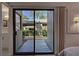 Private patio with access from bedroom and walkway at 201 Woodland Dr # 201, Osprey, FL 34229