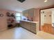 Clean kitchen featuring cabinetry and countertop space at 201 Woodland Dr # 201, Osprey, FL 34229