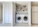 Laundry closet with washer and dryer included at 201 Woodland Dr # 201, Osprey, FL 34229