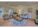 Relaxing living room featuring comfortable seating and a tiled floor at 201 Woodland Dr # 201, Osprey, FL 34229