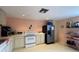 Simple kitchen with appliances and ample storage at 201 Woodland Dr # 201, Osprey, FL 34229